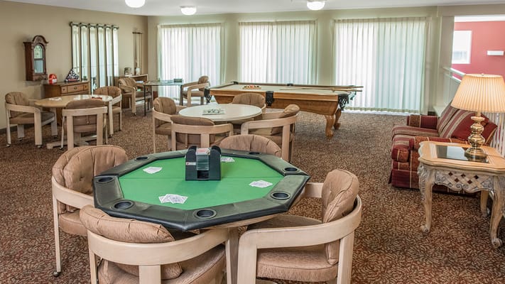Interior view of a common area with game tables
