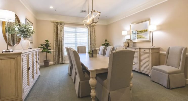 Bright dining room with large table and chairs