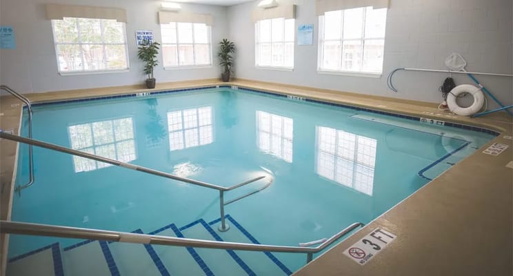 Indoor swimming pool with large windows