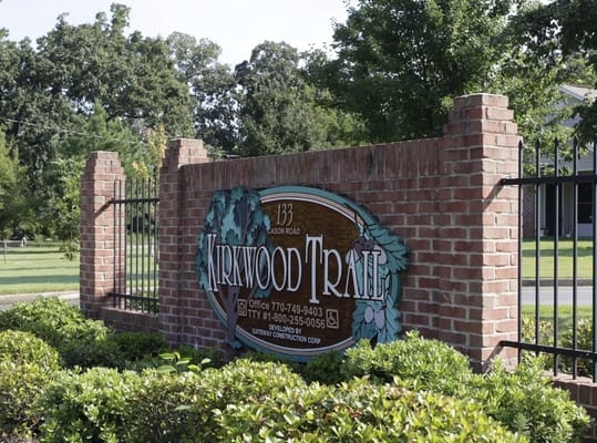 Sign for Kirkwood Trails Senior Apartments at the entrance