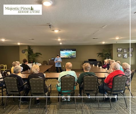 Residents participating in an activity in a common room