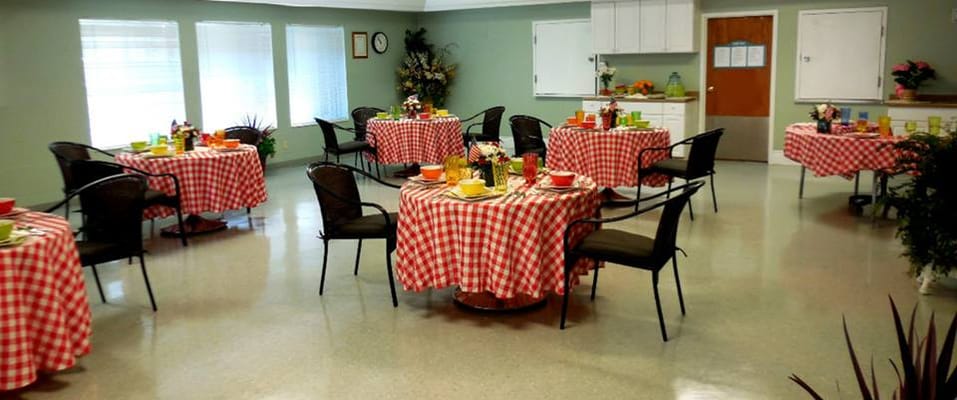 Dining area with tables set for a meal