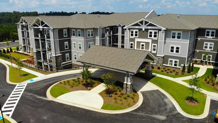 Aerial view of the building exterior and entrance