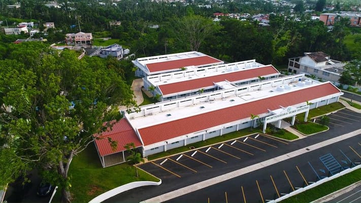 Aerial view of Montehiedra Home Estates facility with outdoor space