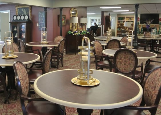 Interior view of a common area with tables and chairs