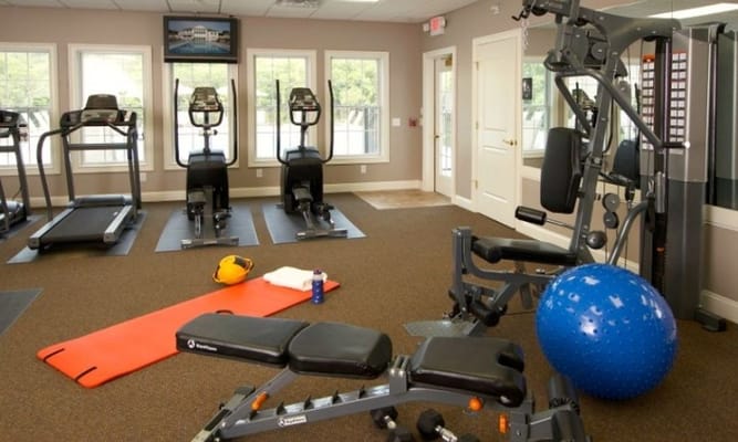 Interior view of a fitness room with exercise equipment