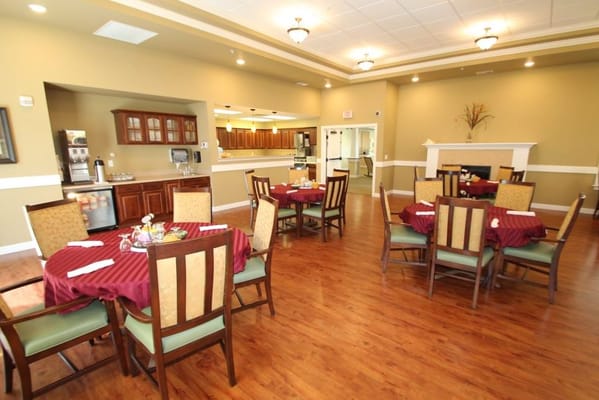 Dining area with tables set for residents