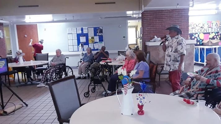 Residents enjoying a live performance in the common area