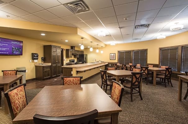 Bright dining room with tables and chairs