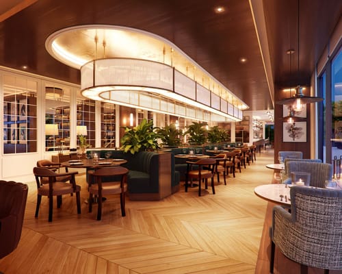 Modern dining area featuring stylish seating and ambient lighting.