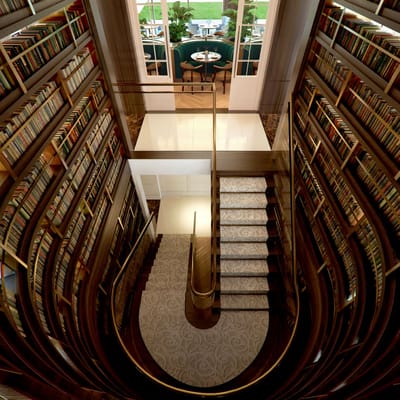 View of a library showcasing a spiral staircase and bookshelves