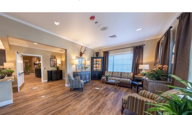 Spacious lobby area with seating and natural light