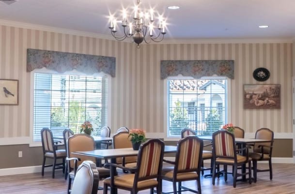 Bright dining room with tables and chairs