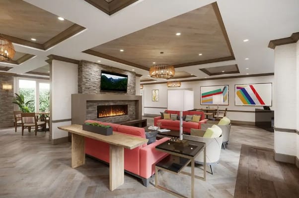 Modern living room with seating and a fireplace