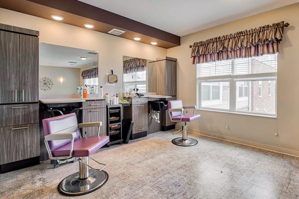 Interior of the hair salon with styling chairs and mirrors