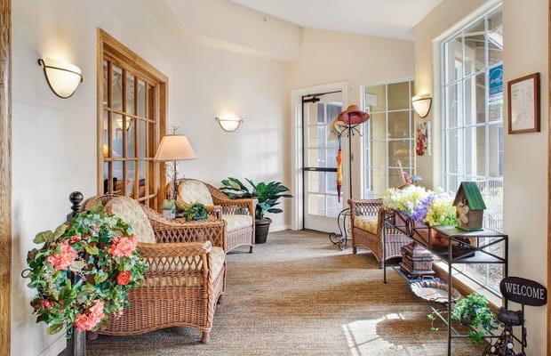 Comfortable seating area in the lobby with plants and decorative elements