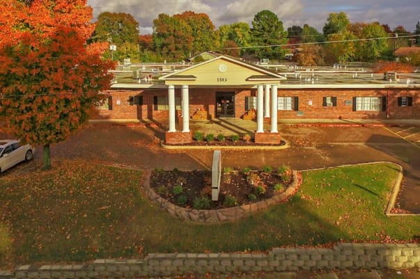 Exterior view of the building with colorful autumn foliage