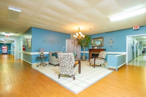 Common area with chairs and decor in a nursing home