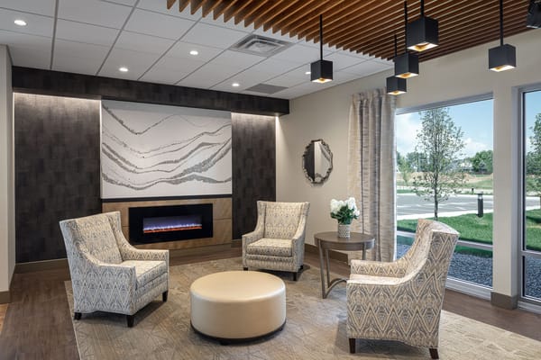 Cozy lounge area with modern seating and decorative elements