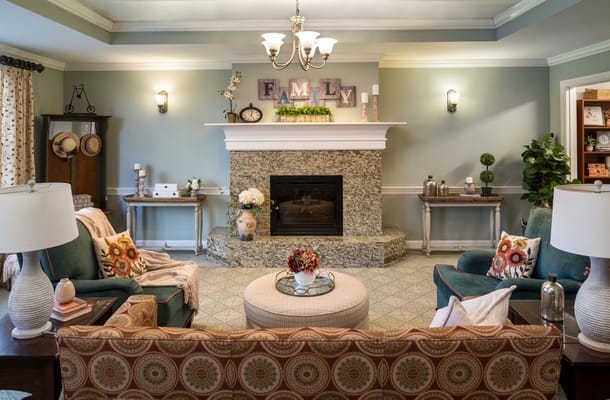 Comfortable living room with fireplace at The Kensington White Plains