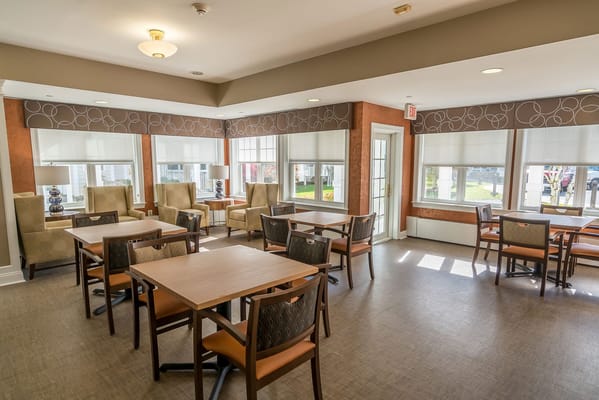 Bright and inviting dining room with tables and chairs