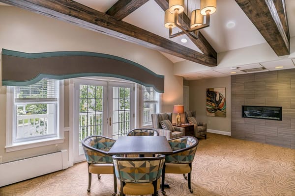 Bright common area with seating and artwork