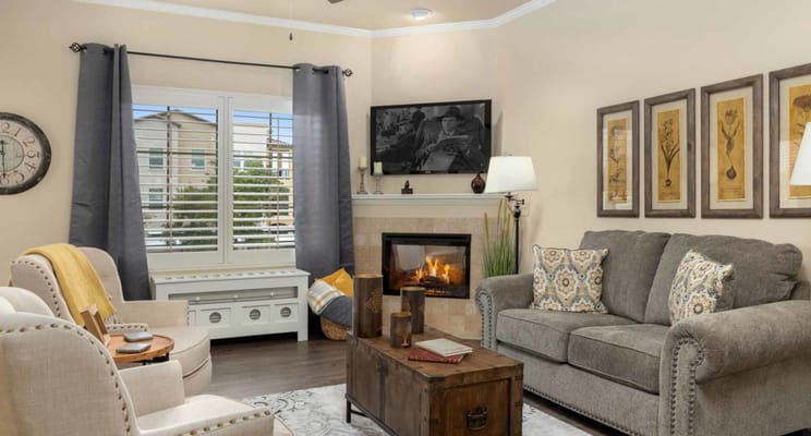 Cozy living room with comfortable seating and a fireplace