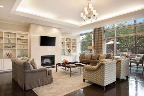 Inviting living room with comfortable seating and large windows