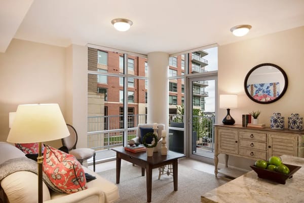 Bright living room with large windows and modern decor