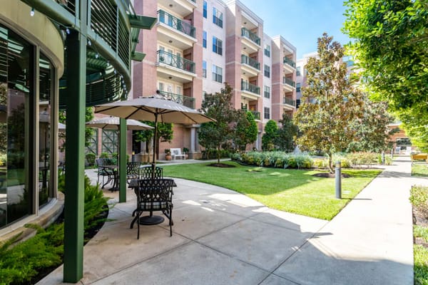 Outdoor living space with seating and gardens