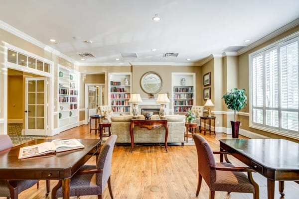 Cozy interior of a common area with bookshelf and seating