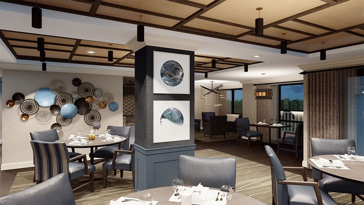 Modern dining area with artwork and seating at The Virginian.
