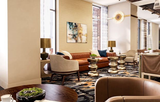 Cozy living room with leather sofa and decorative tables