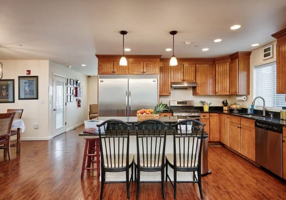 Modern kitchen with wooden cabinets and kitchen island
