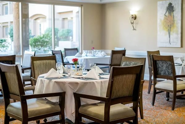 Dining area set for a meal with decorations