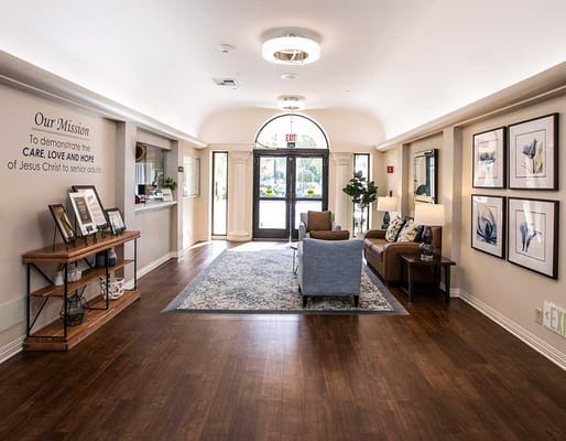 Interior view of the lobby with seating and decorative art