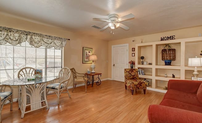 Inviting living room with a dining table and comfortable seating