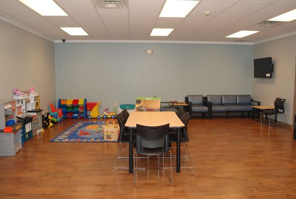 Common area with seating and play area