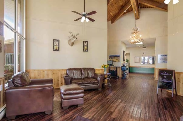 Cozy lobby area with seating and natural light