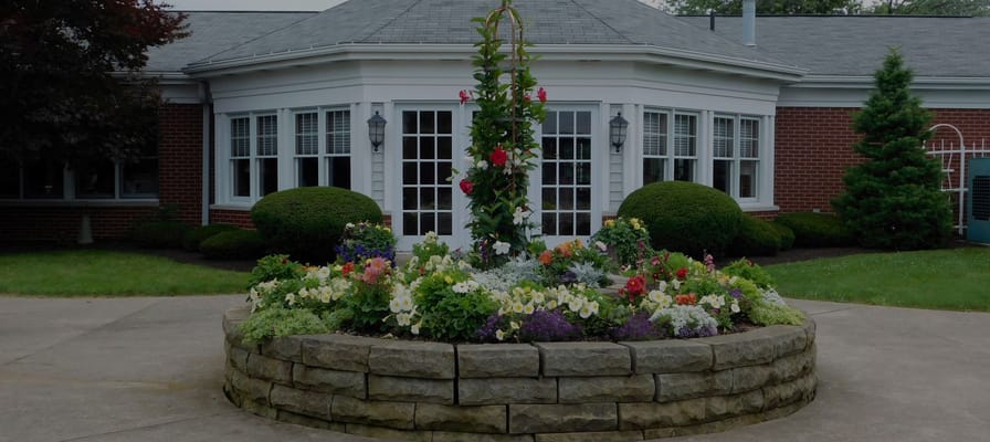 Exterior view of Windsor Medical Center with flowers and entryway
