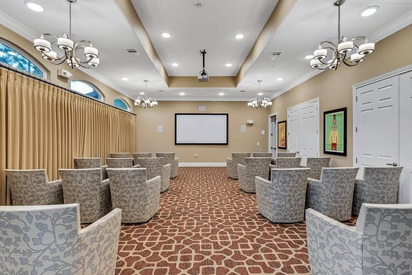 Interior common area with seating and screen