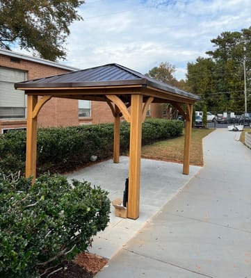 Outdoor gazebo in a landscaped area