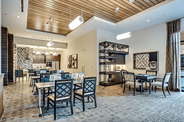 Modern common area with dining tables and chairs