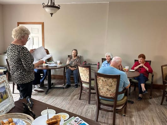 Residents gathered in a common dining area for an activity
