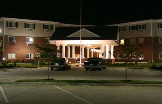 Night view of the facility building entrance