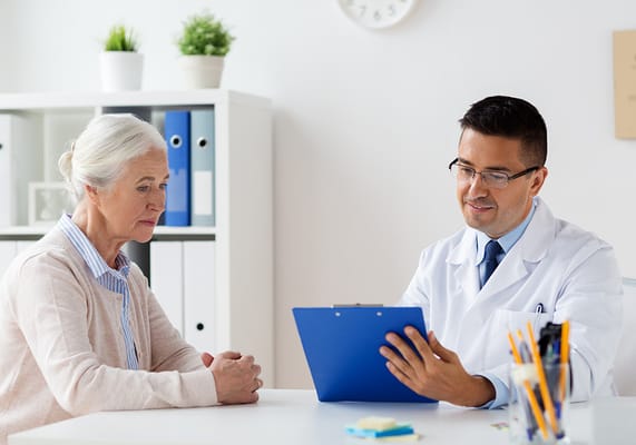 Doctor consulting with a senior resident in an office
