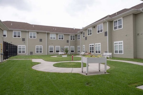 Courtyard area with benches and landscaped garden