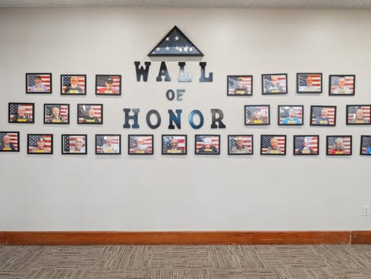 Wall of Honor featuring residents' photos