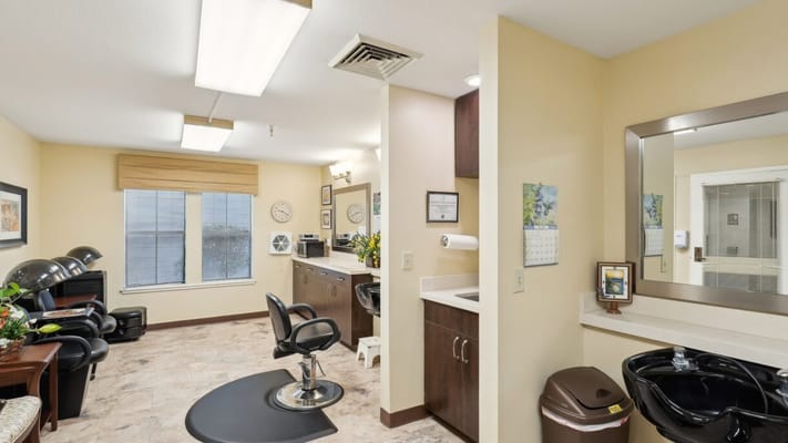 Interior view of a salon space with styling chairs