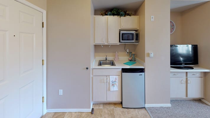 Interior view of a kitchenette area in a resident room